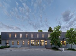 Beleuchtete Außenfassade des Haus der Jugend