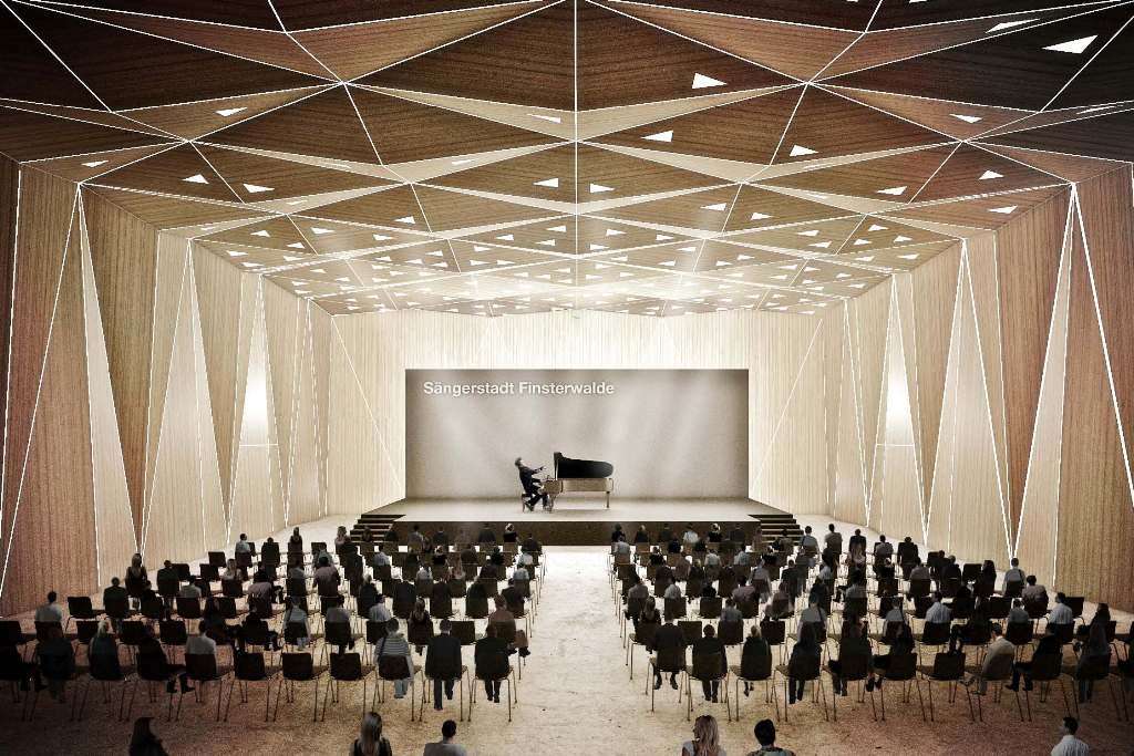 Das Bild zeigt eine Visualisierung eines Konzertsaals mit einem Musiker an einem Flügel auf der Bühne und besetzten Stuhlreihen.